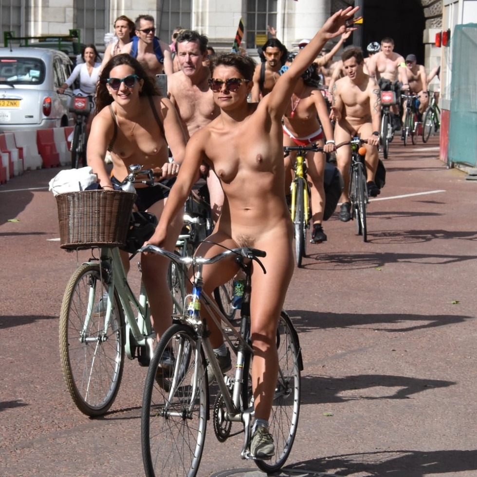 Naked women on a bicycle