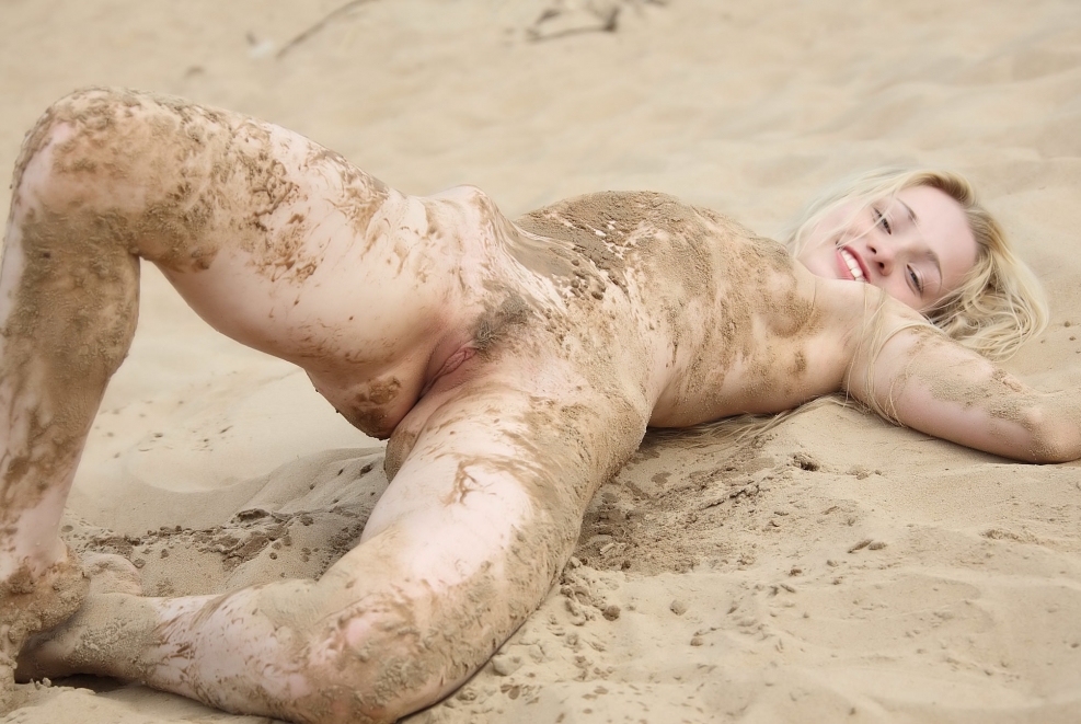 Adult women naked in mud