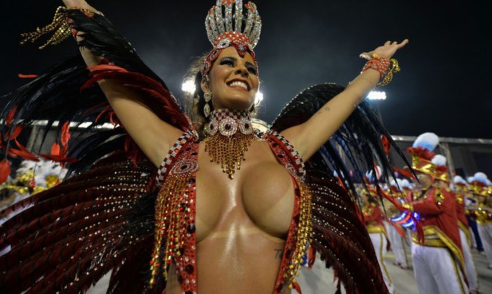 Naked women in carnival costumes