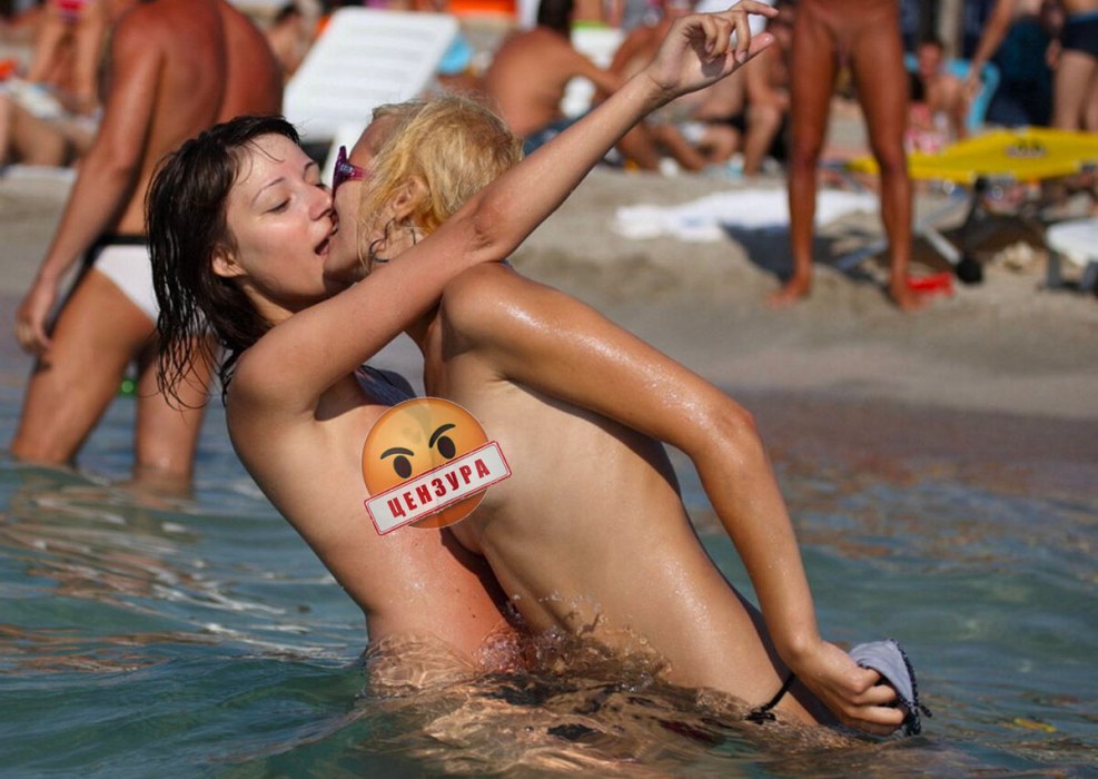 Nudist sunbathing spreading legs