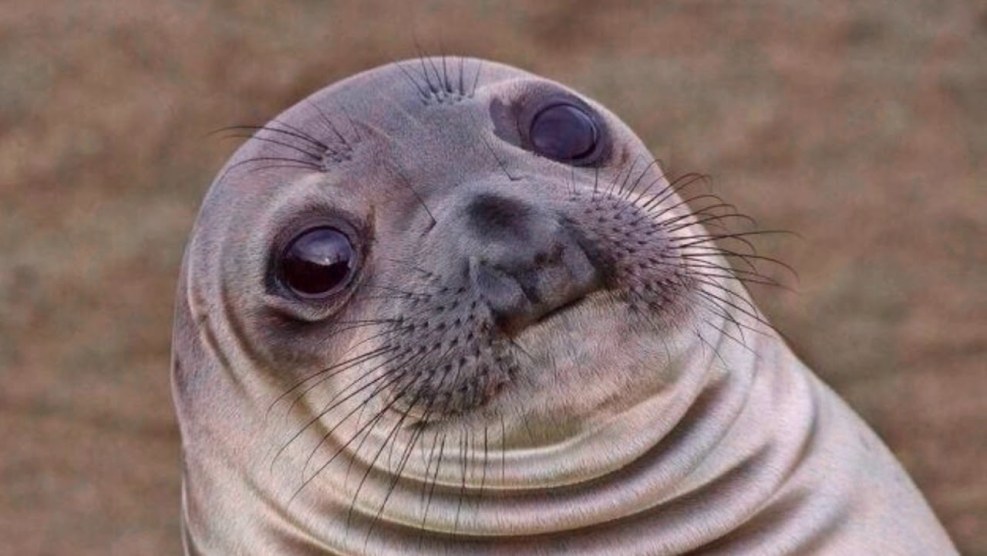 Smiley finger to lips