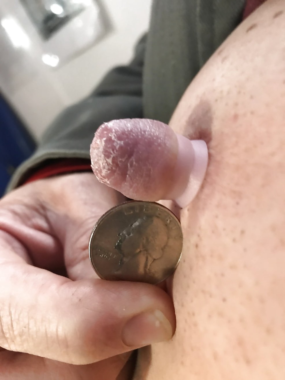 Naked man with big nipples