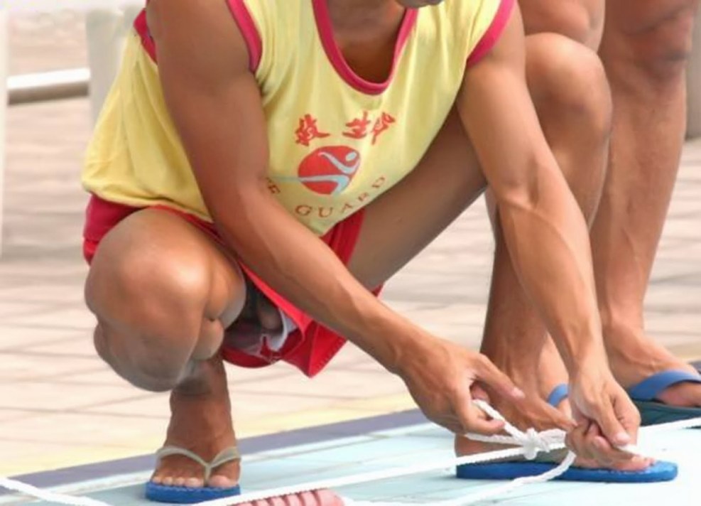 Beautiful boys in swimming trunks
