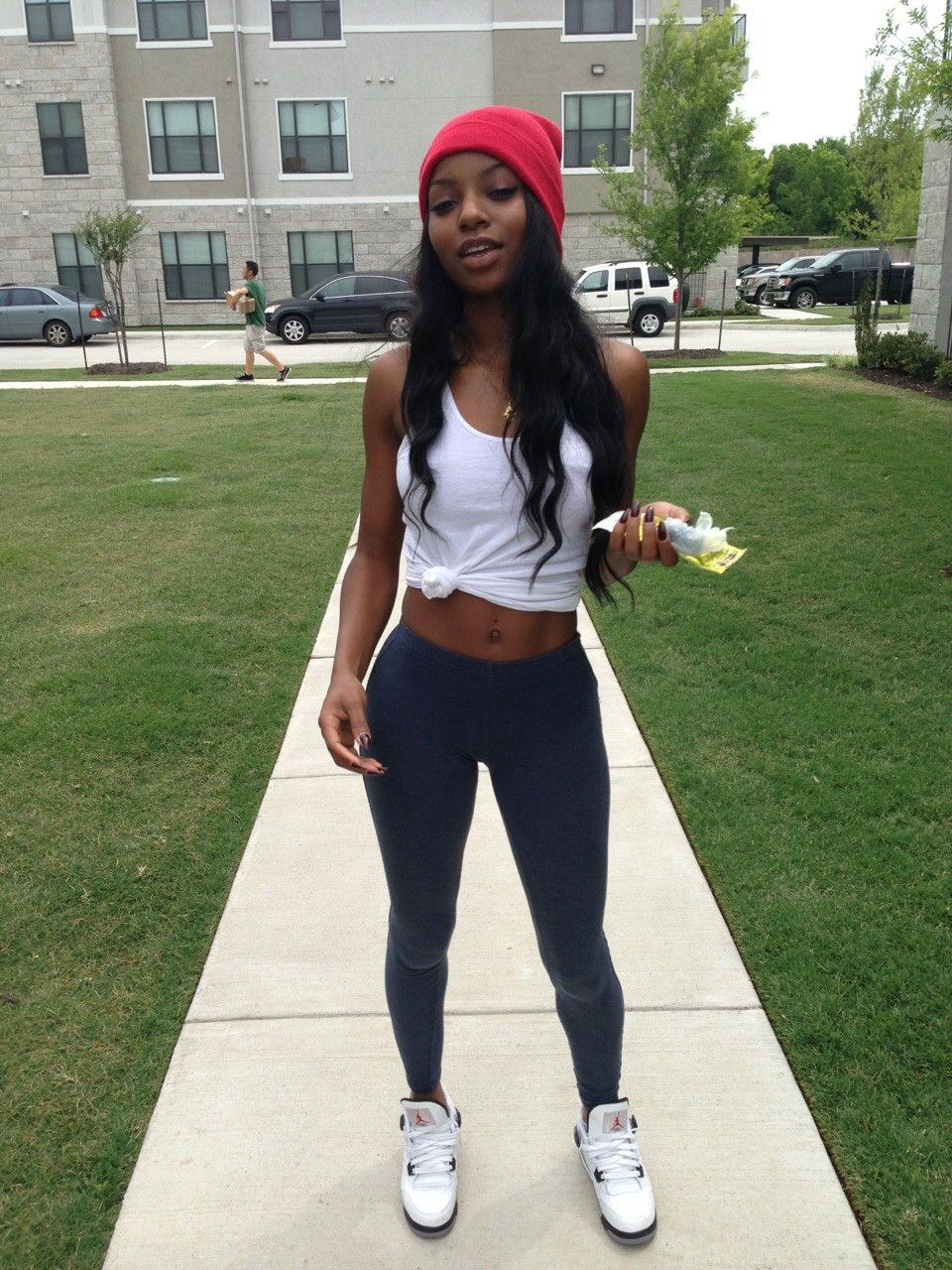 The girl poses in a swimsuit