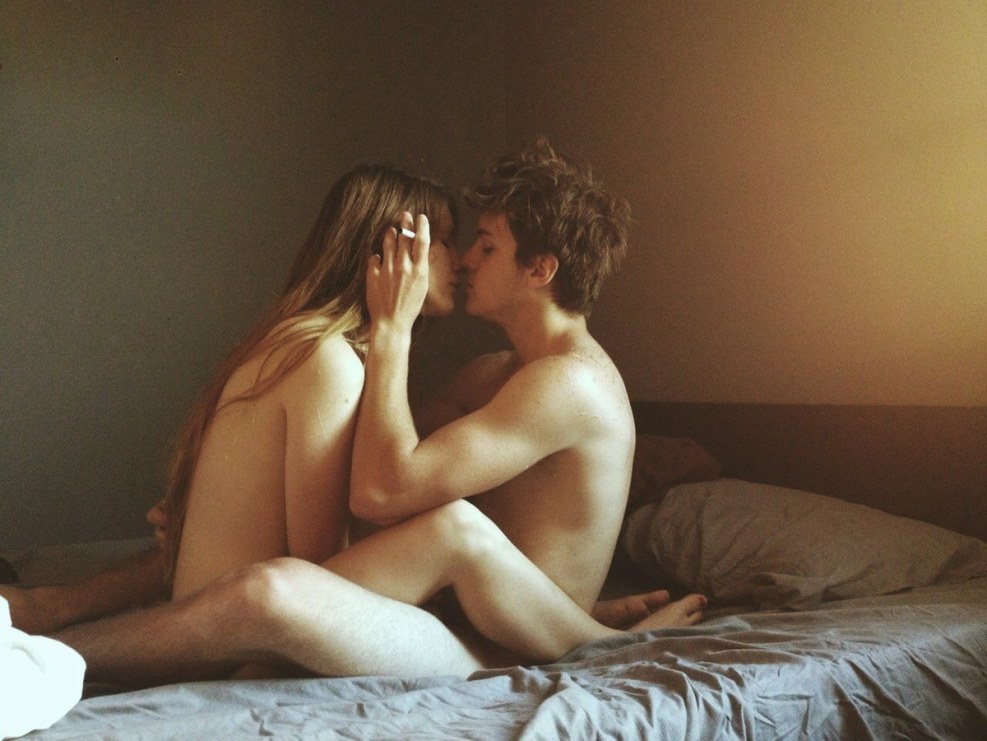 Love of teenagers in bed