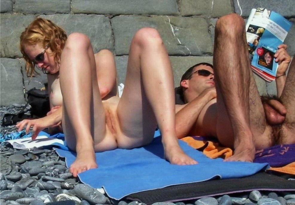 Spread her legs on the beach spied