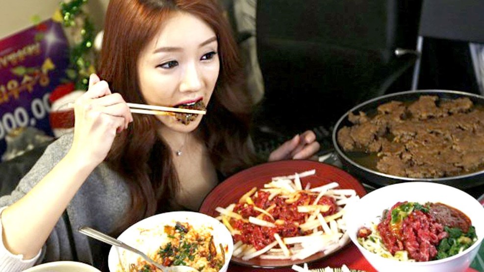Koreans eat in a restaurant