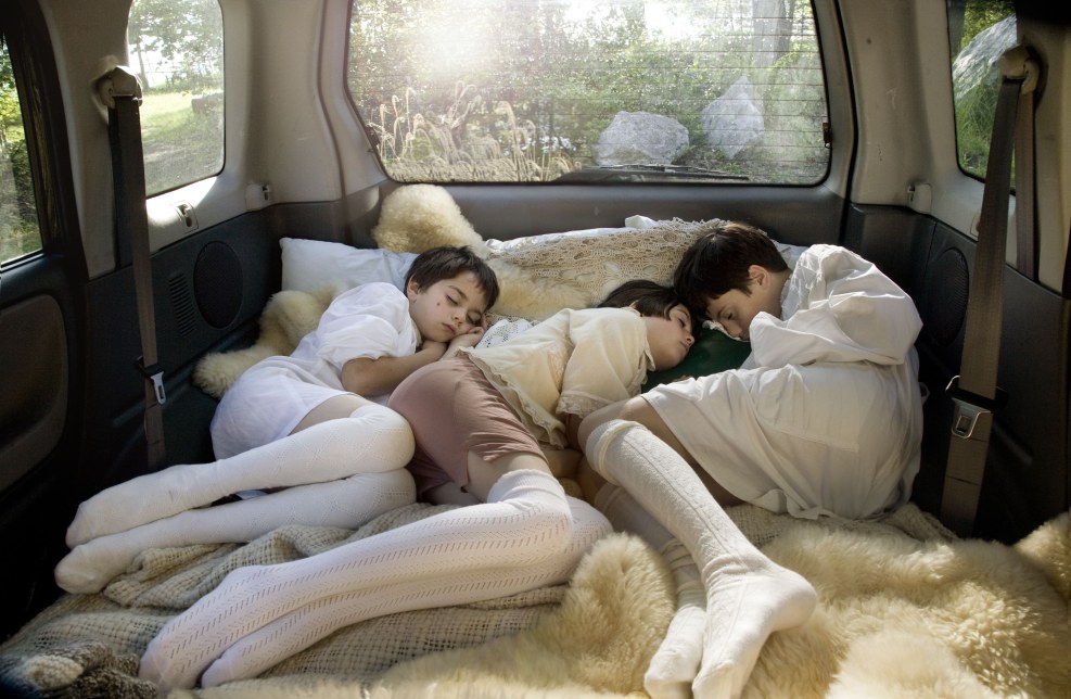 The boy in pantyhose sleeps