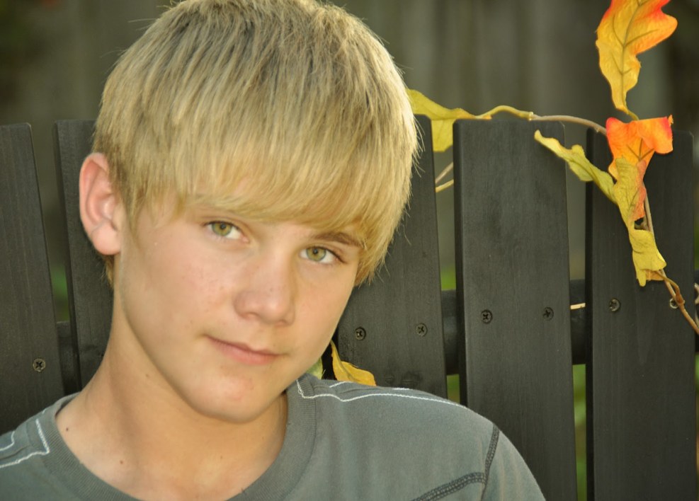 Boy model on the lake