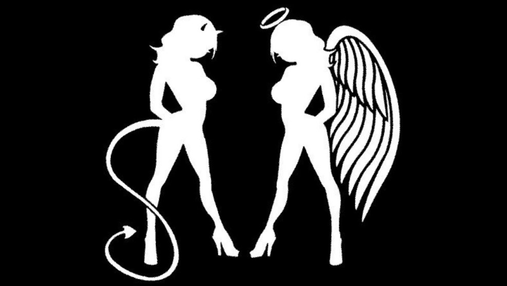 The silhouette of the girl of an angel and the devil