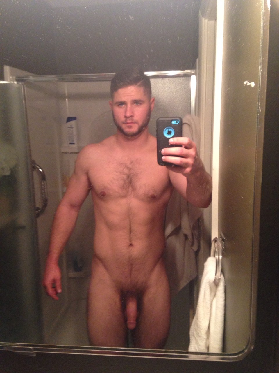 A man shows a Home Selfie point