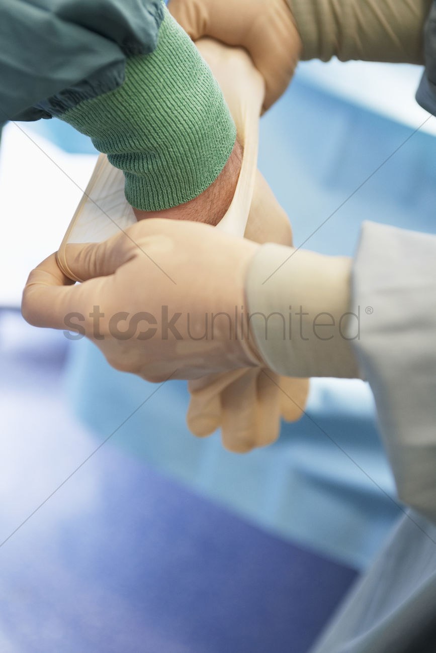 The guy puts gloves to the girl