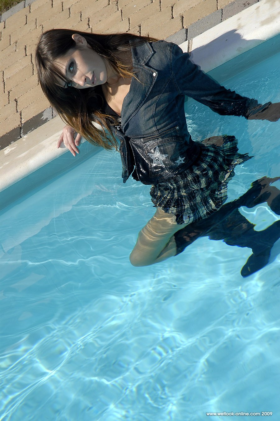 Wetlook in the pool in home dresses