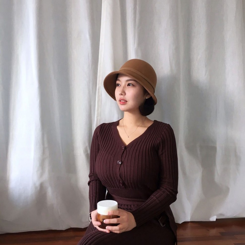 Naked blonde in a sweater