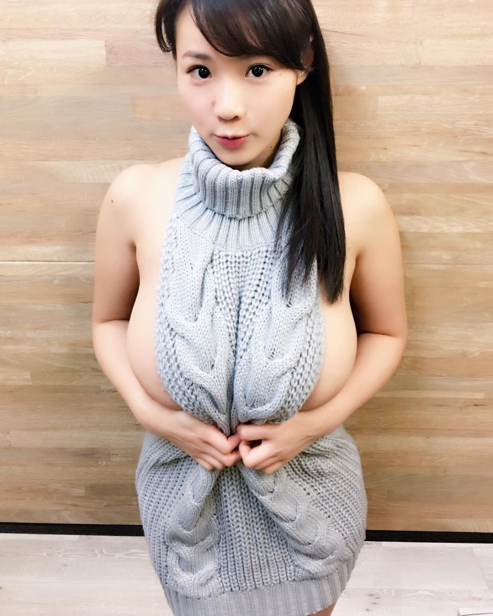 Big breasts in a turtleneck