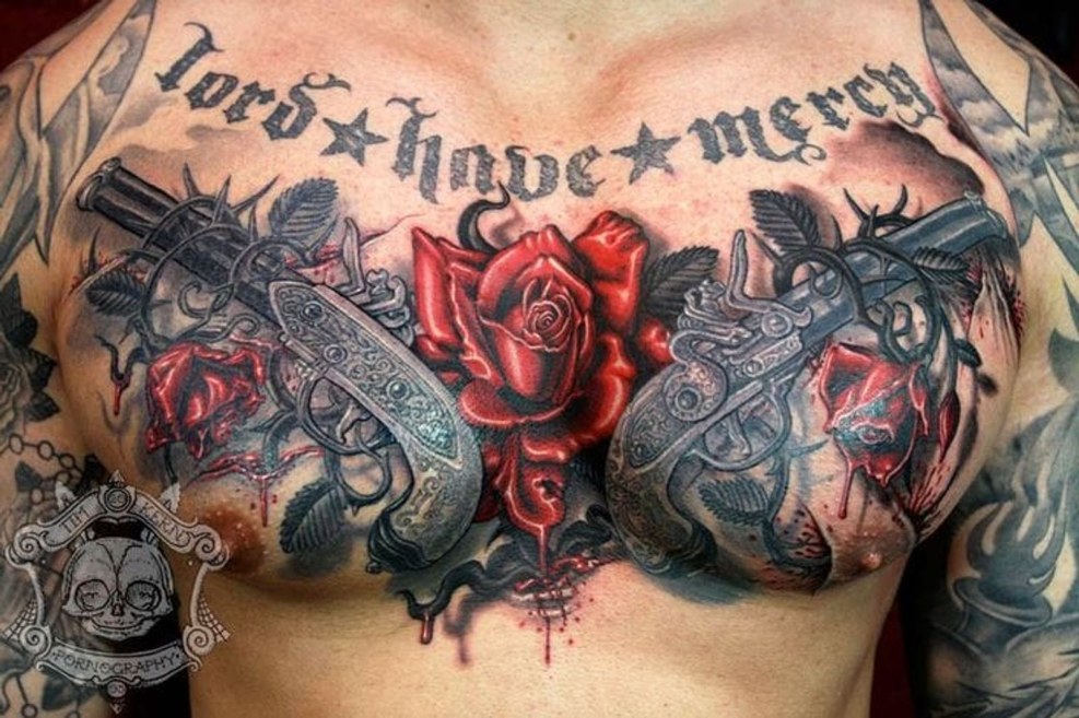 Tattoo pistols on the back