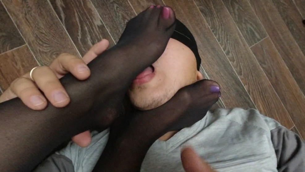 Slave licking legs in stockings