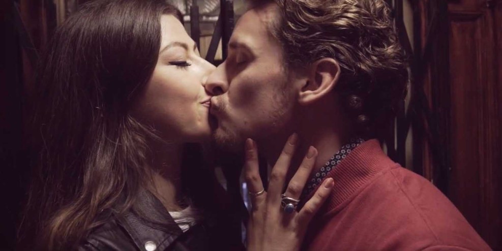 Caresses a member through pants