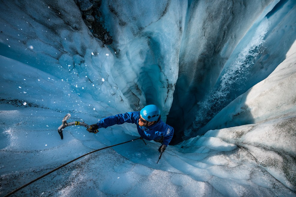 A man kisses a woman in bed