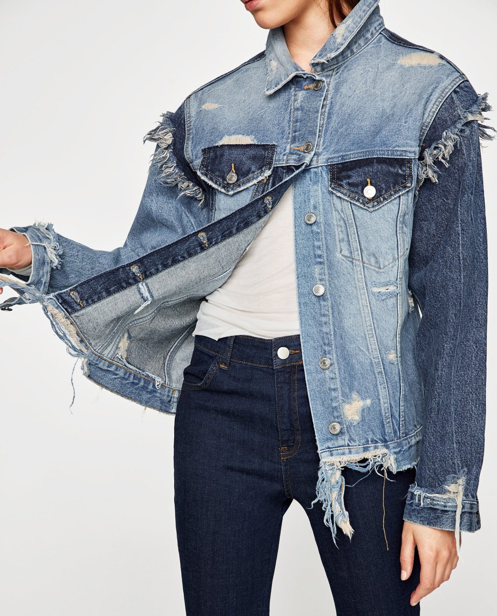 Curly blonde in jeans shorts