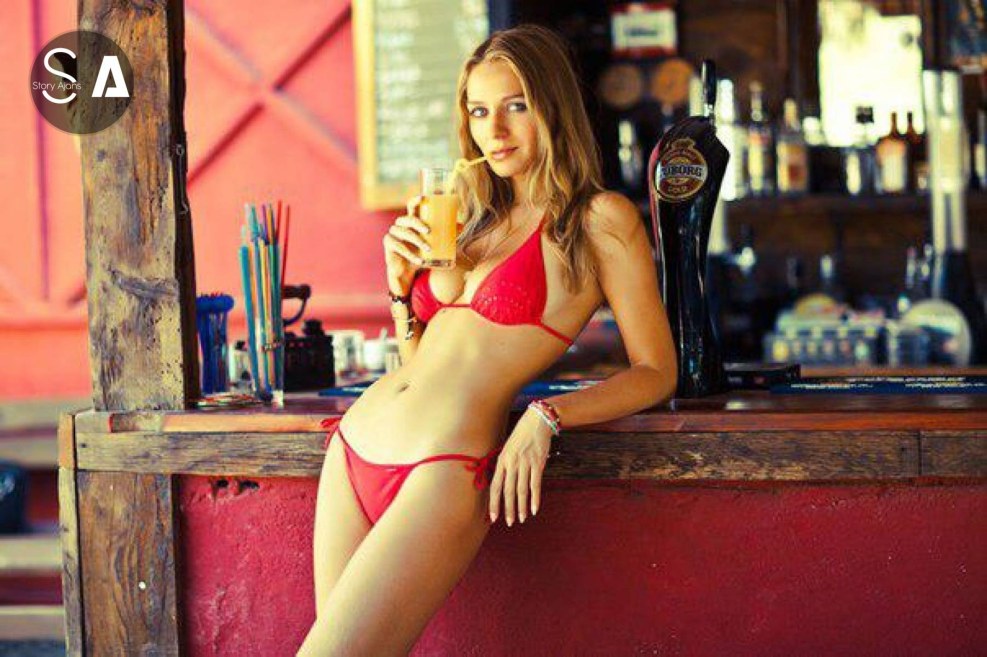 Girl in a Superman swimsuit