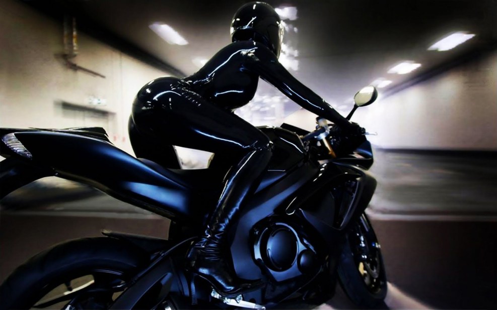 Girl latex motorcycle