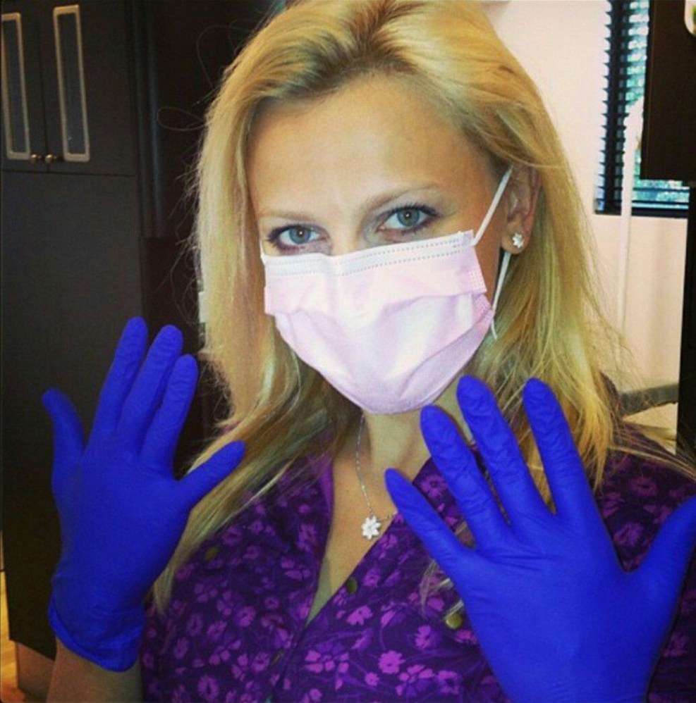 Women in medical gloves