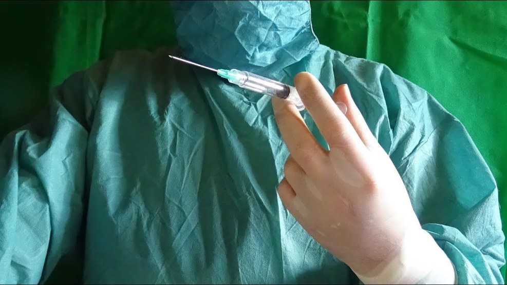 Girl in medical gloves