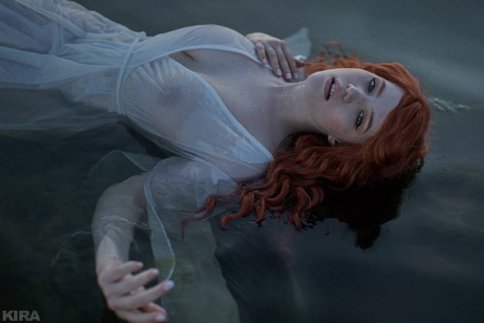 Girl in a gorgeous dress with a crown