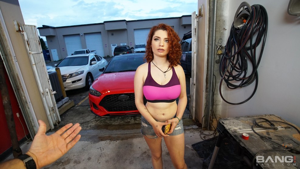 The girl votes on the side of the road