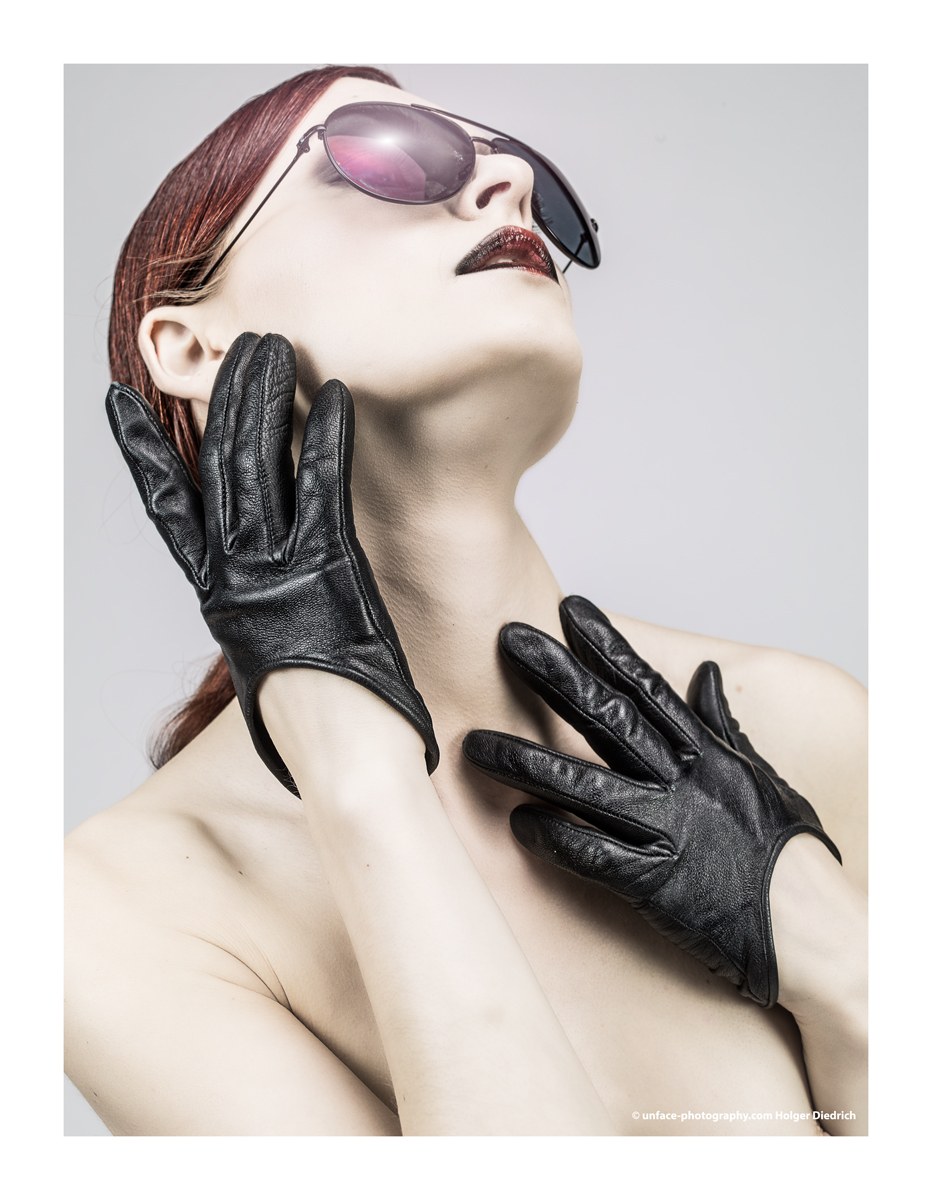 Beautiful girls in leather gloves