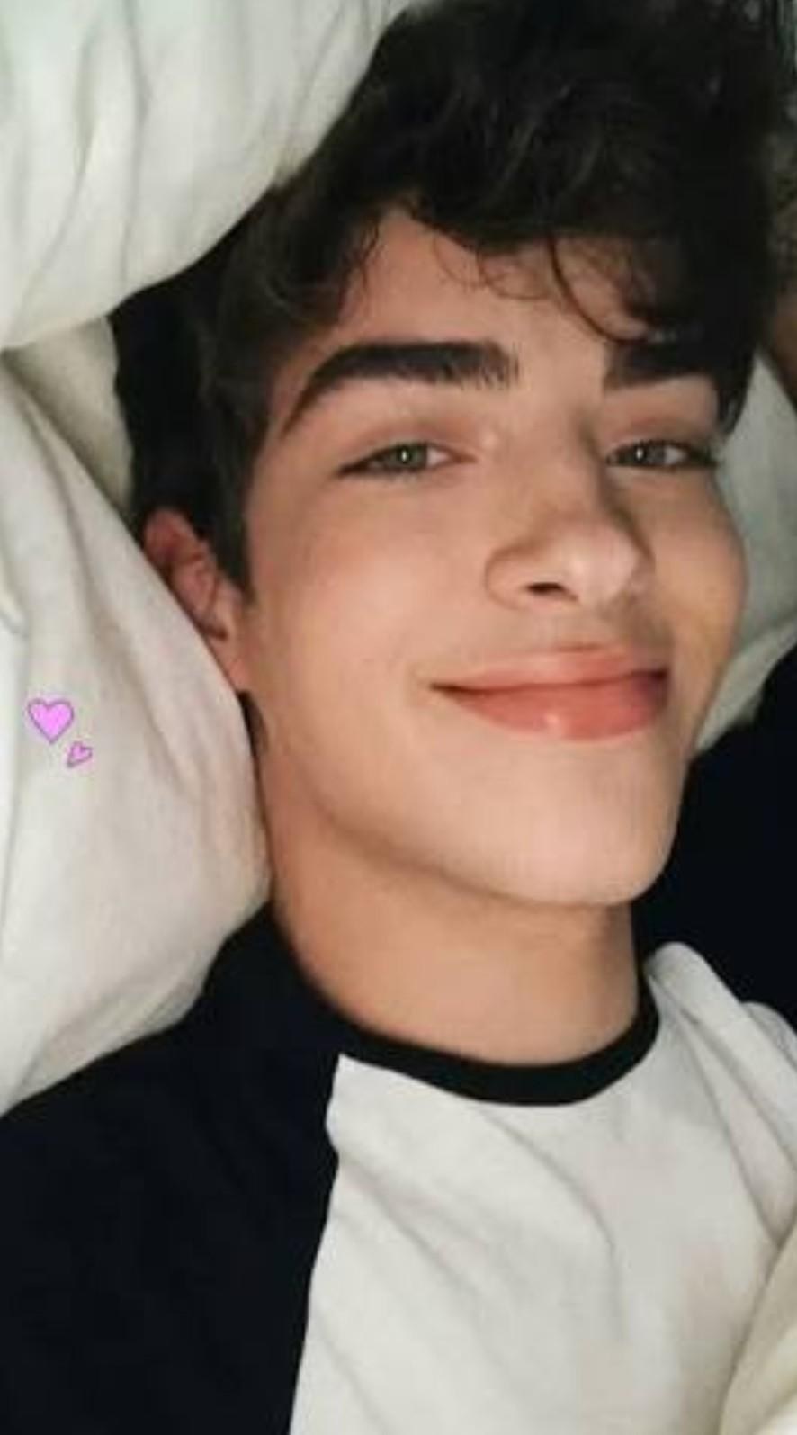 Manu Rios in the mirror