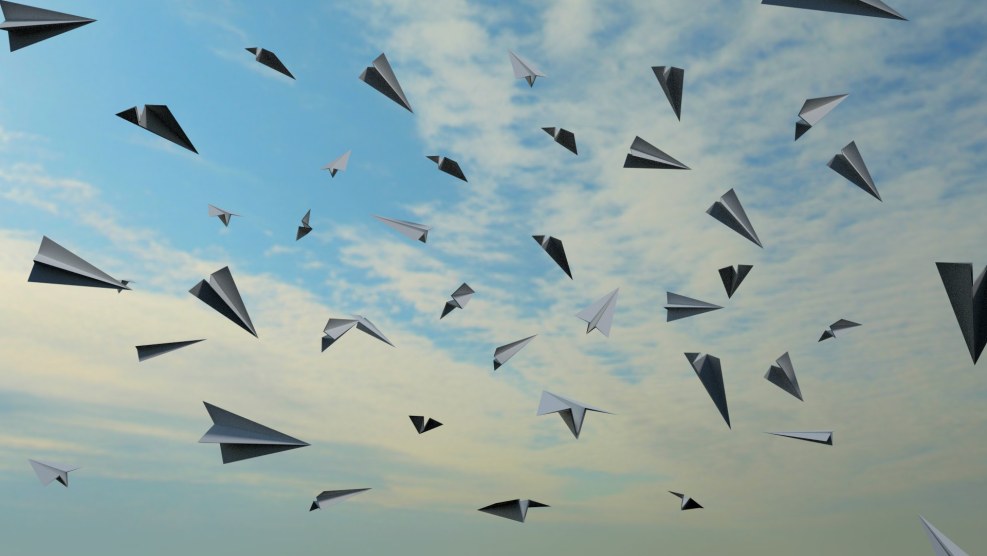 Multi -colored paper aircraft