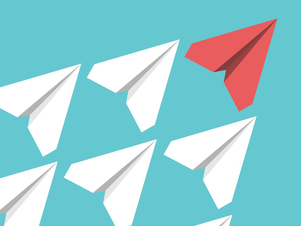 Paper aircraft on a black background