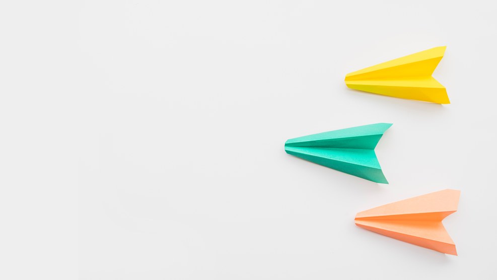 Paper aircraft in flight