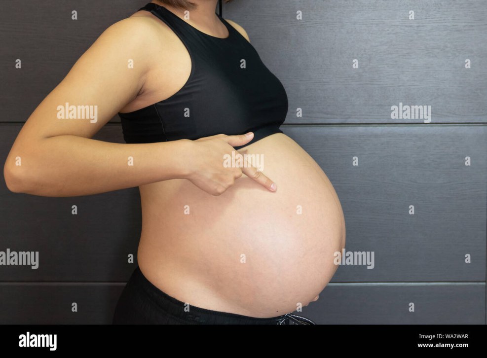Pregnant Belly and heels
