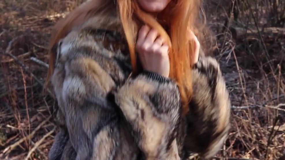 Domina in a fur coat