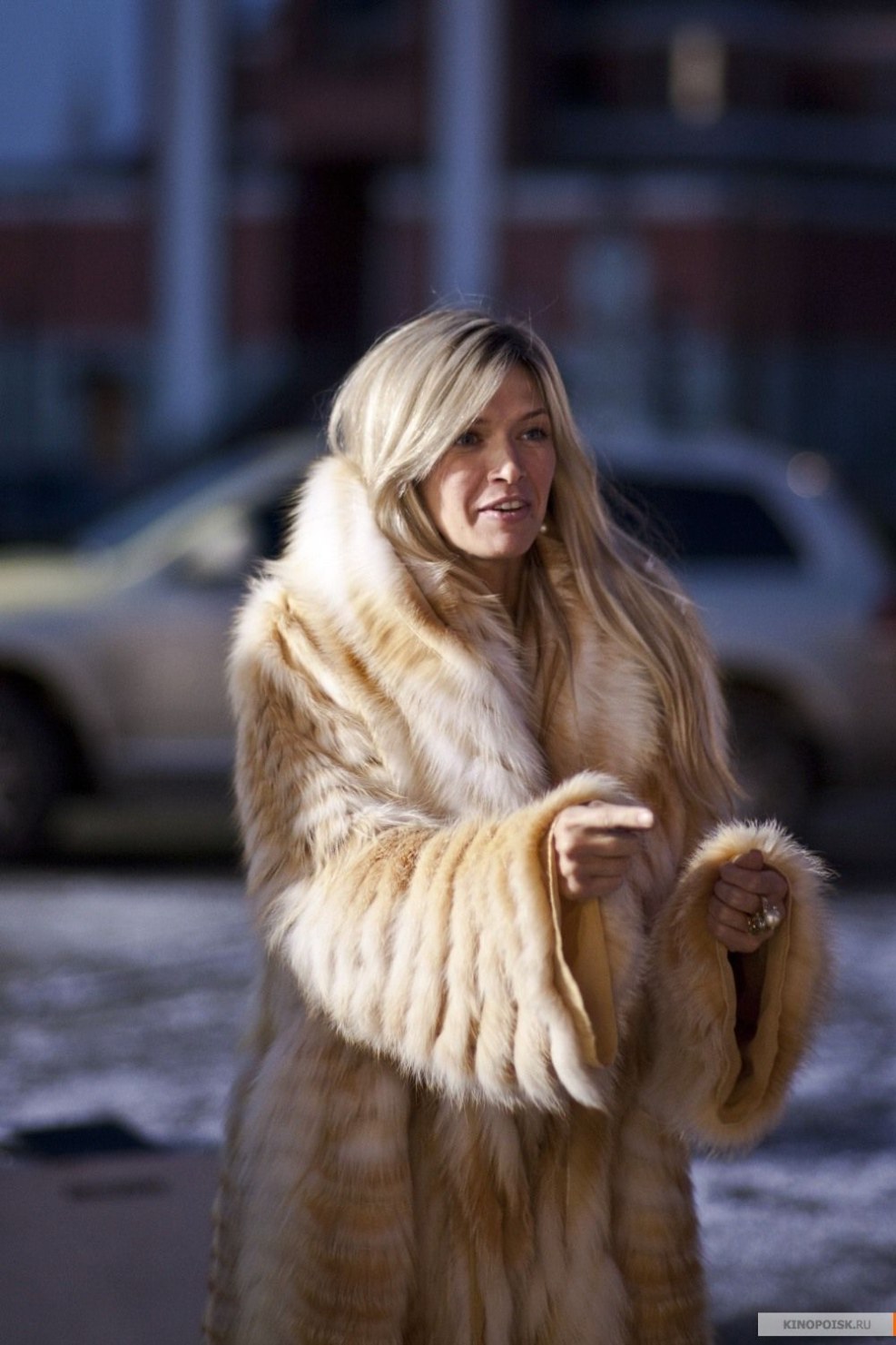 Ashley Robbins in a fur coat