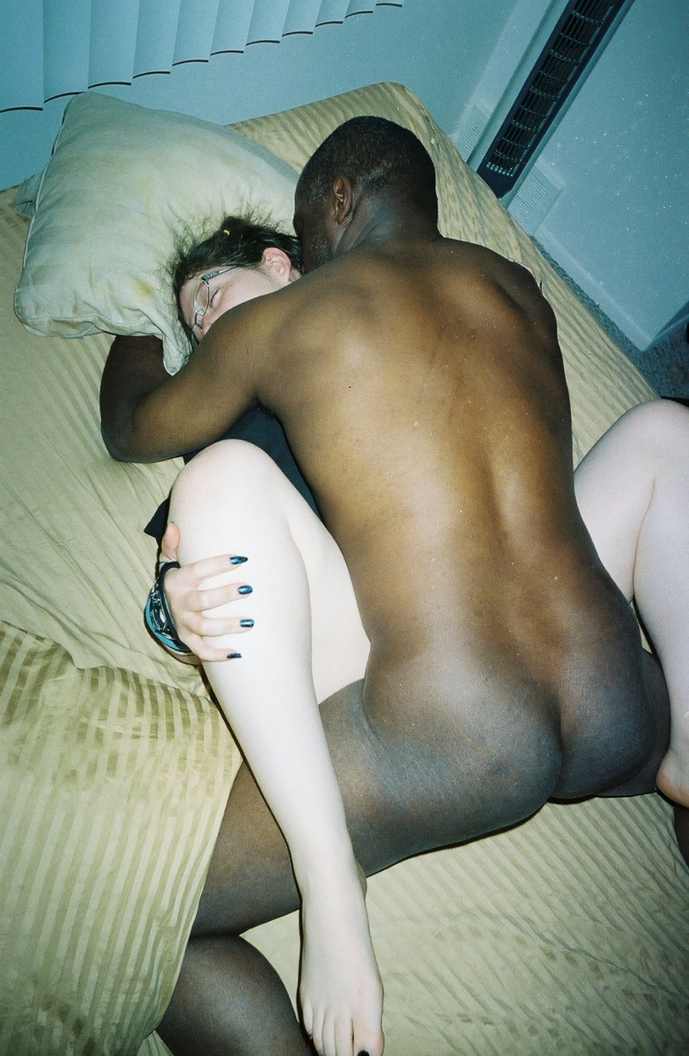 A man touches a naked woman