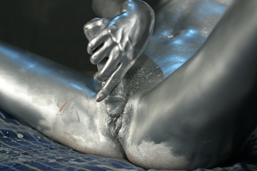 Naked in silver paint