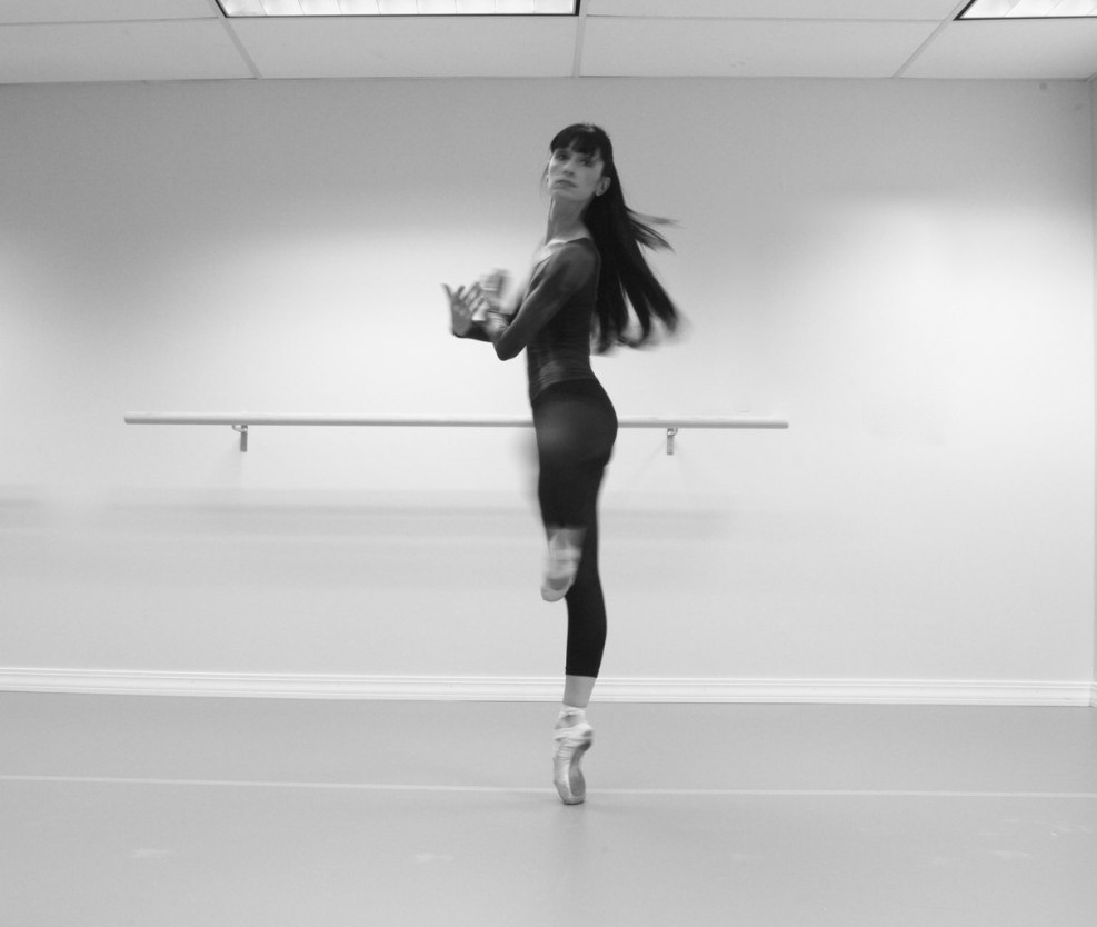 The girl threw her head back