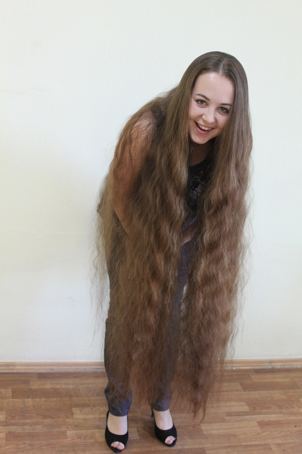 Naked brunette with long hair