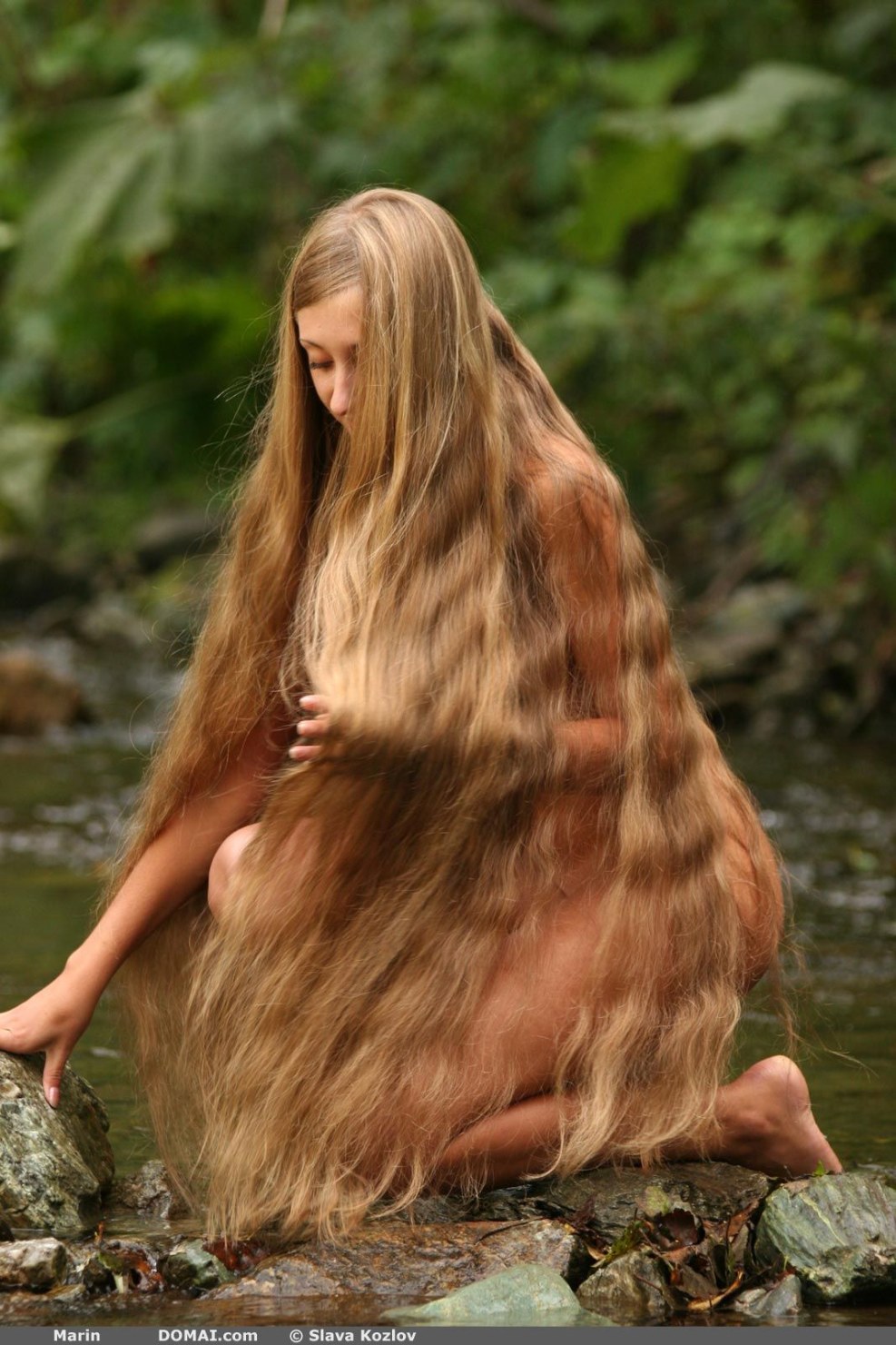 Naked blonde with long hair