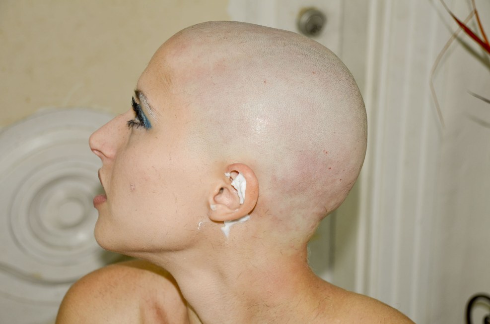 Women shave their heads on the head of bdsm