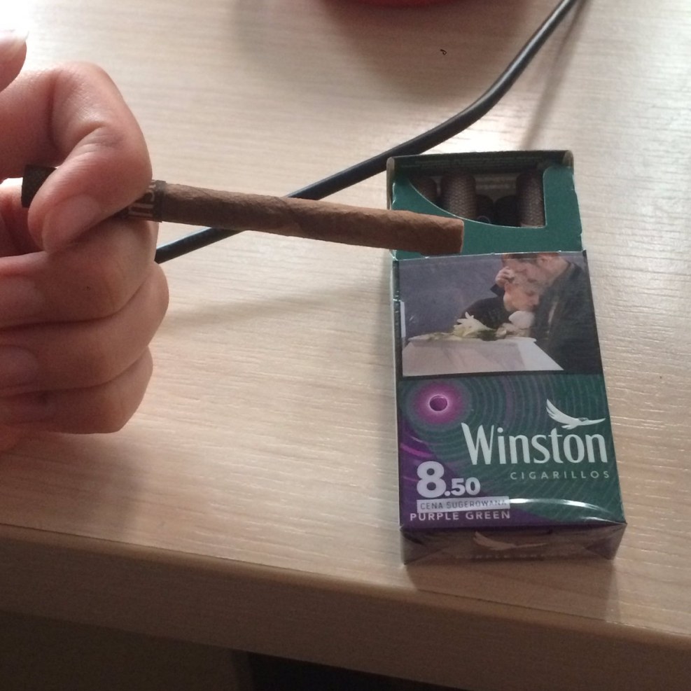 Winston with a grater on the fingers