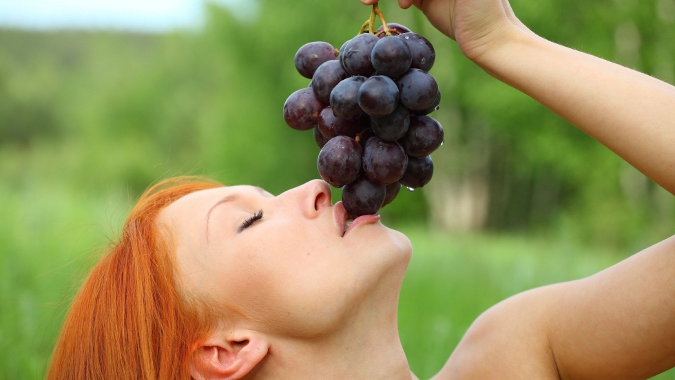 Girl with grapes