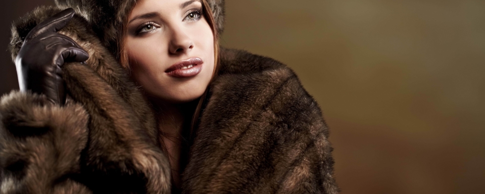 Girl in a huge fur coat