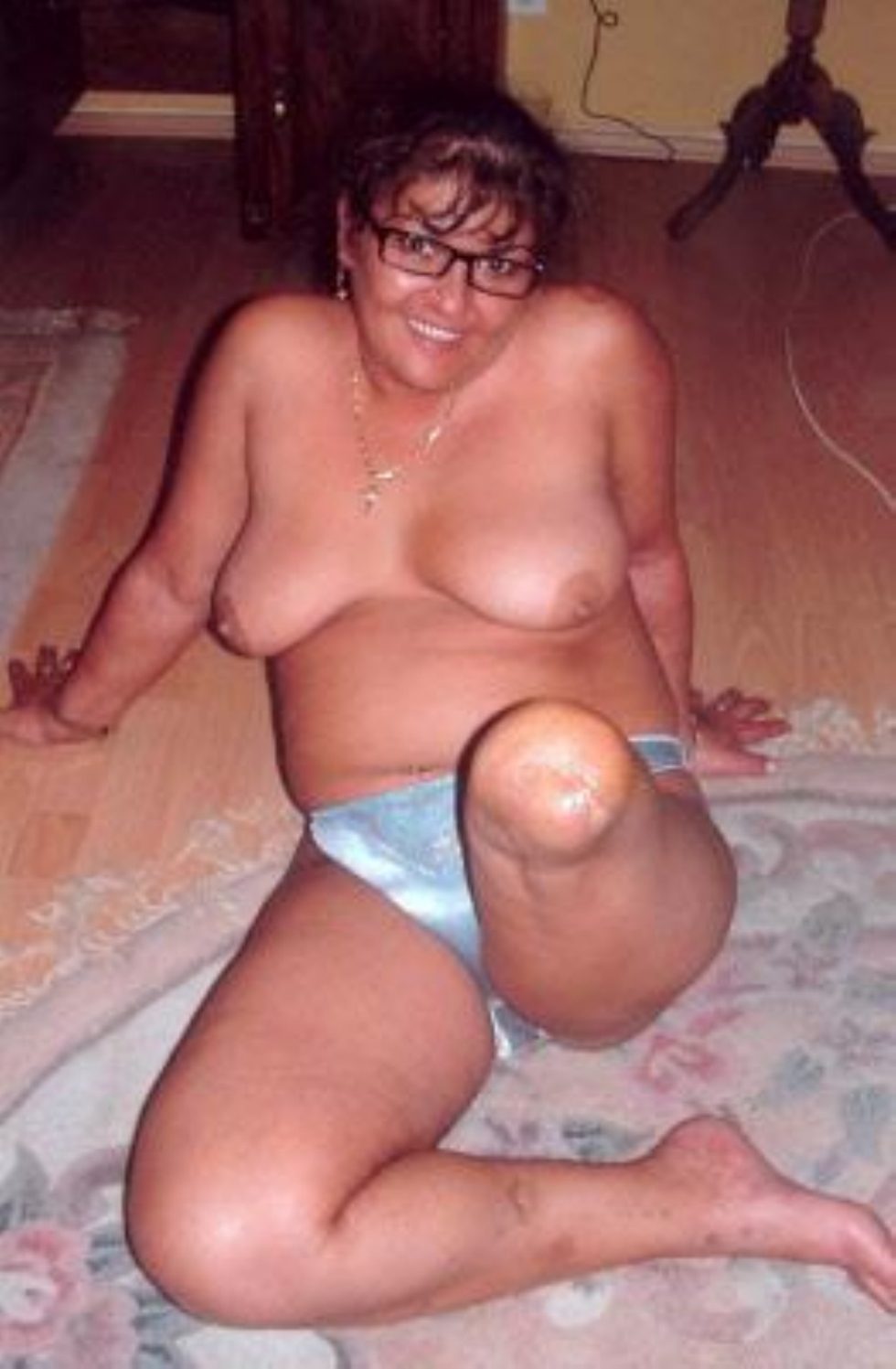 Amputi in bed with a belly