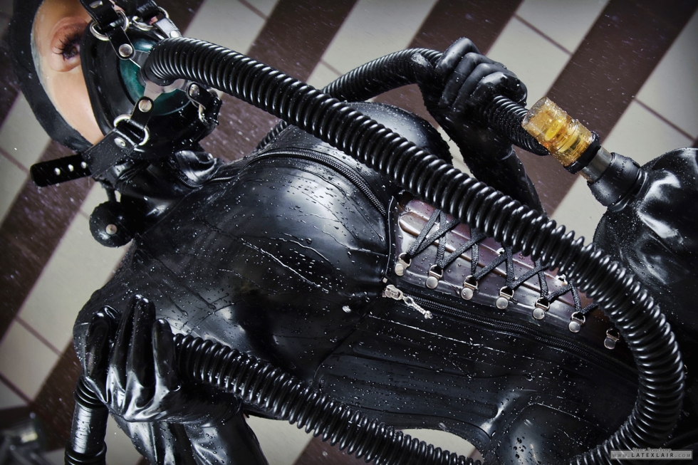 Latex suit with gas mask