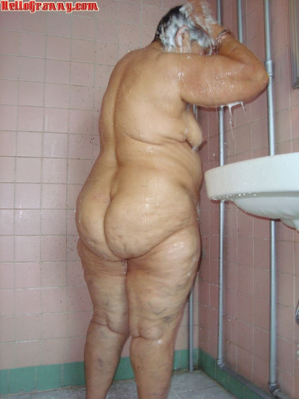 Naked grandmother in the shower of Lesbian
